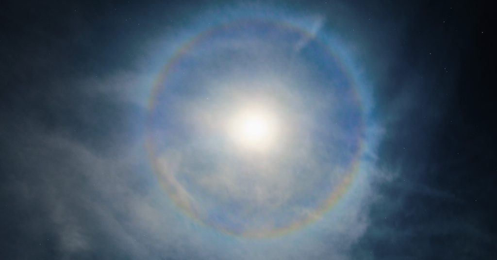 This incredible image shows a rare phenomenon of the moon surrounded by a celestial rainbow - Featured image