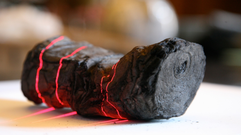 AI reveals first word of ancient scroll torched by Mount Vesuvius - Featured image